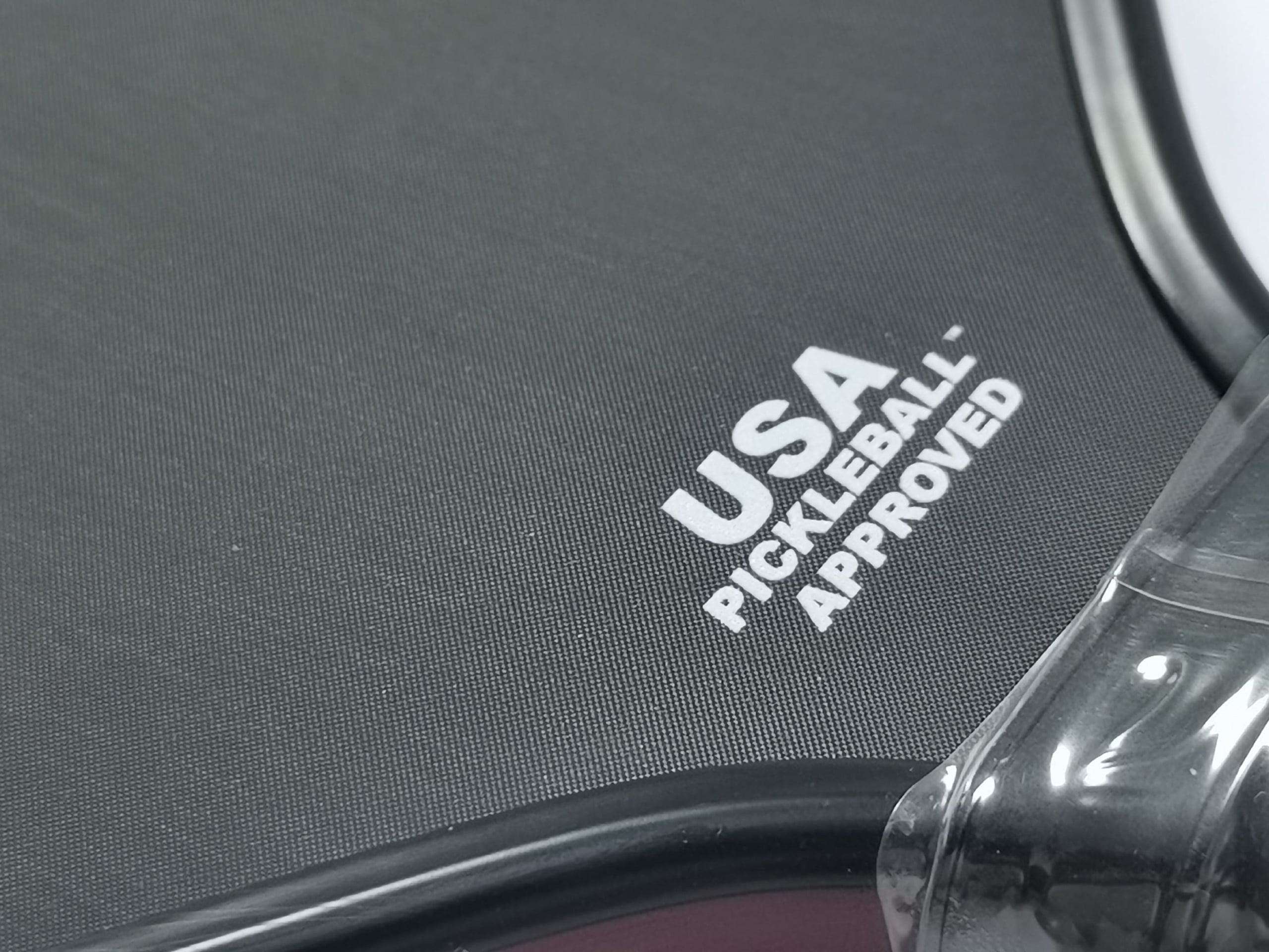 T700 raw carbon fiber pickleball paddle surface close-up